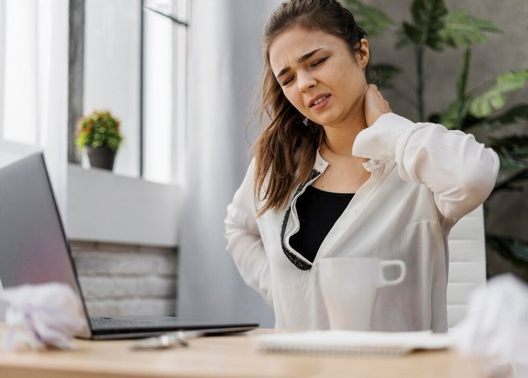 woman-having-neckache-while-work.jpg