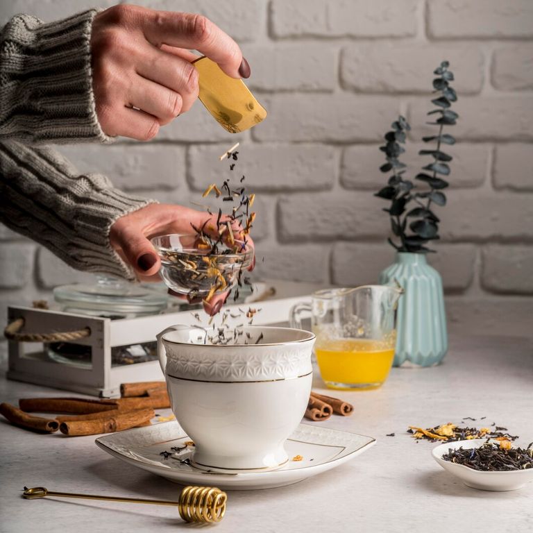 pouring-tea-herbs_23-2148550435.jpg