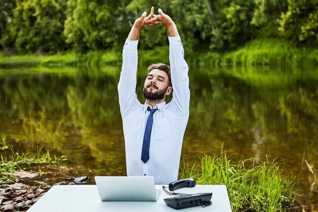 full-length-man-using-mobile-phone-lake_1048944-4267631.jpg