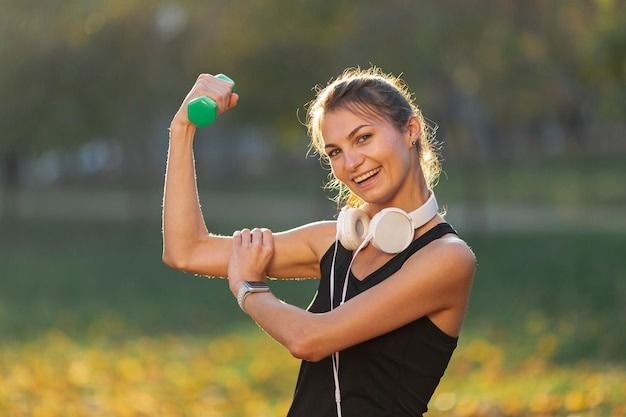 happy-woman-showing-her-muscles.jpg