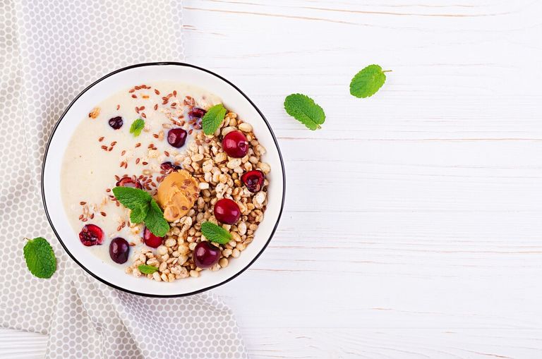 bowl-homemade-granola-with-banana-mashed-peanut-butter-fresh-berries_2829-10661.jpg