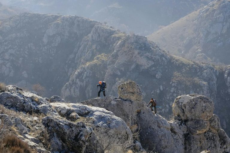 free-photo-of-people-hiking-in-mountains.jpeg