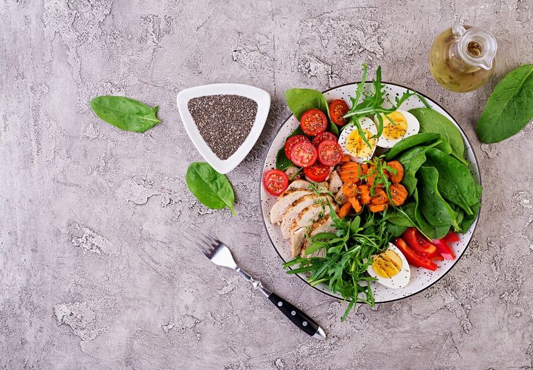 plate-with-keto-diet-food-cherry-tomatoes-chicken-breast-eggs-carrot-salad-with-arugula-spinach-keto-lunch-top-view_2829-16938.jpg