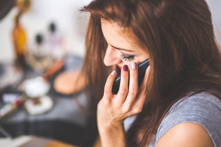 person-woman-hand-smartphone.jpg