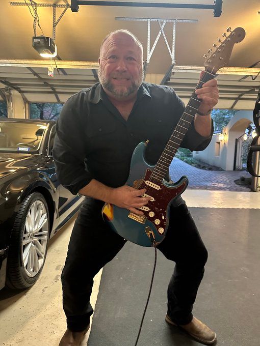 Alex Jones Guitar GBbasKcXMAAxsvs.jpeg