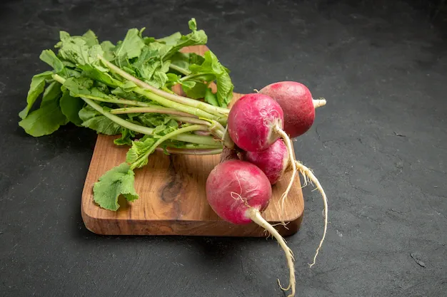 front-view-fresh-radish-with-greens-dark-table-ripe-salad-fresh_140725-72947 - 2025-03-03T205502.136.webp