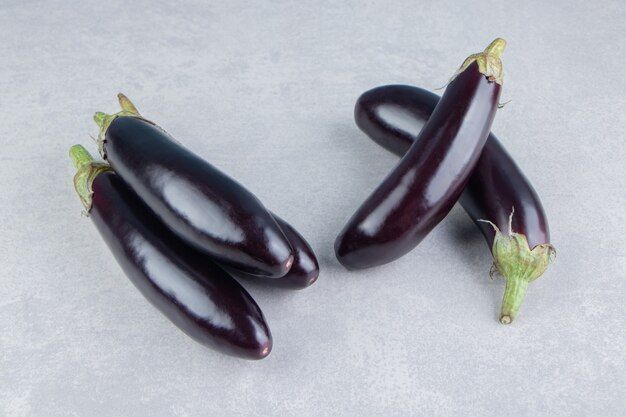 delicious-ripe-eggplants-white-surface_114579-51926.jpg