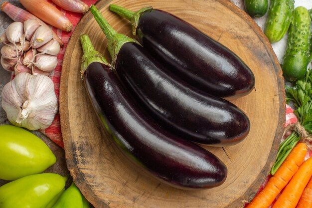 top-view-fresh-vegetables-composition-with-eggplants-white-background_140725-140117.jpg