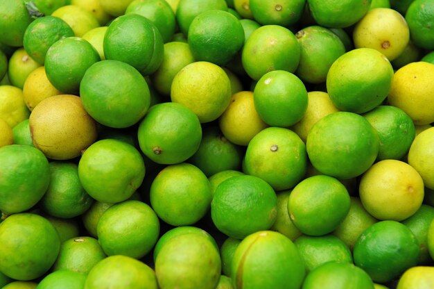 close-up-fresh-juicy-limes-pile_167946-164.jpg