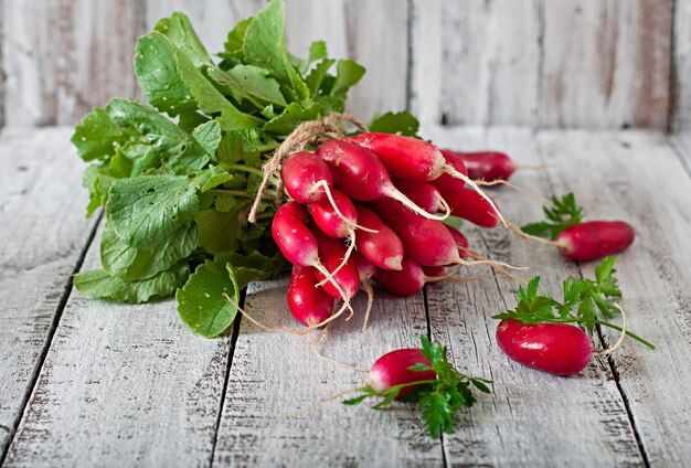 fresh-bunch-radishes-old-wooden-background_2829-16533.jpg