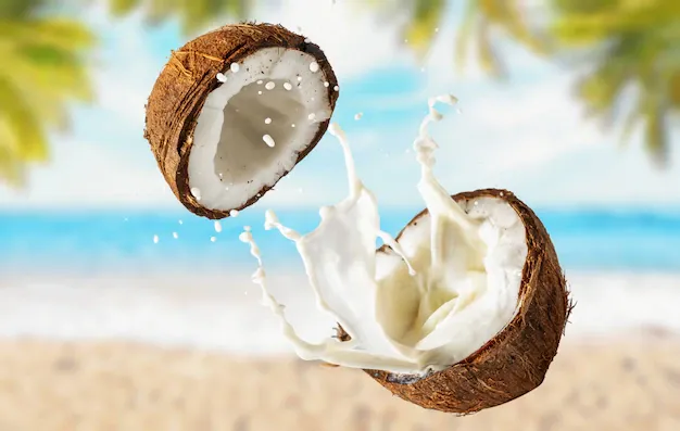 coconut-with-milk-beach-with-palm-trees_172251-749.webp