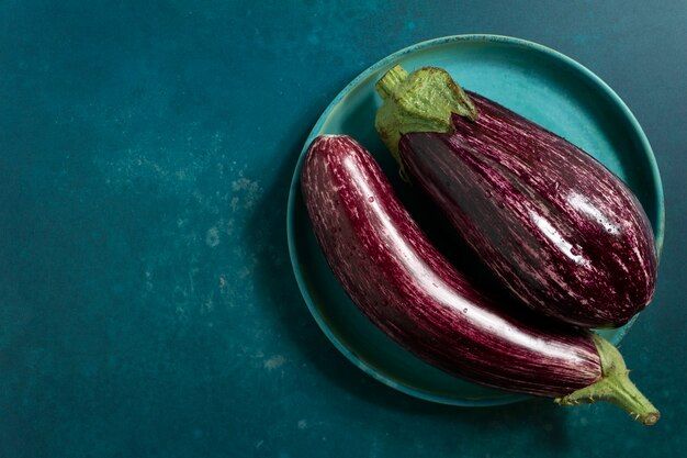 view-raw-eggplants-still-life_23-2150561768.jpg