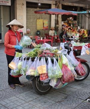 free-photo-of-street-vendor-selling-fresh-vegetables-on-scooter.jpeg