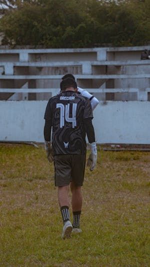 free-photo-of-football-player-walking-on-field-in-uniform.jpeg