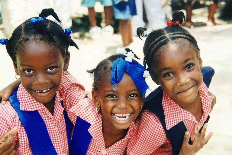 three-girls-smiling-in-school-uniform-barrett-town-jamaica-4268-opt-800x533.jpg