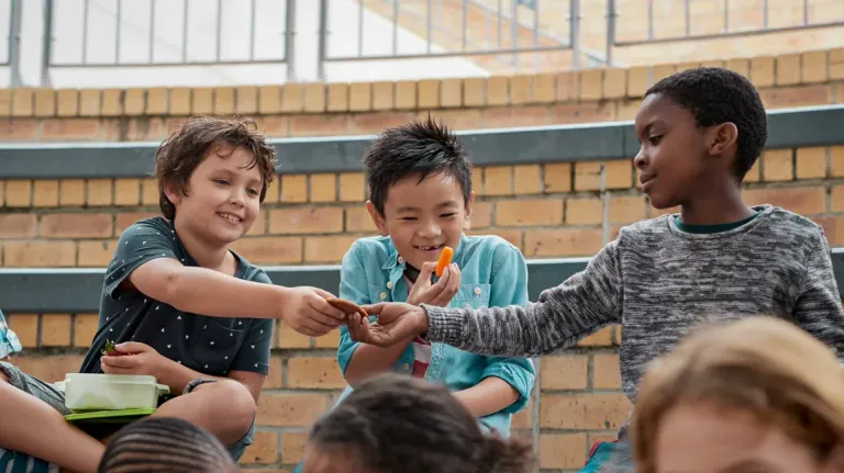 School-children-having-lunch-together-header.webp