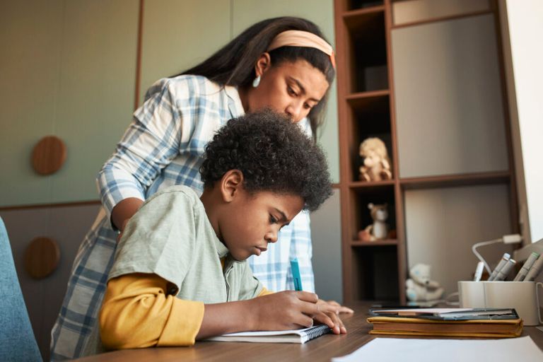 medium-shot-mom-kid-doing-homework-1024x683.jpg