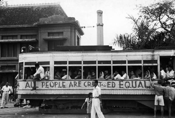 Signs+written+on+the+street+bus,+reminding+citizens+of+Indonesia's+inalienable+rights.jpg