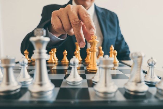 Premium Photo _ Businessman leadership playing chess and thinking strategy plan about crash overthrow the opposite team and development analyze for successful of corporate.jpeg