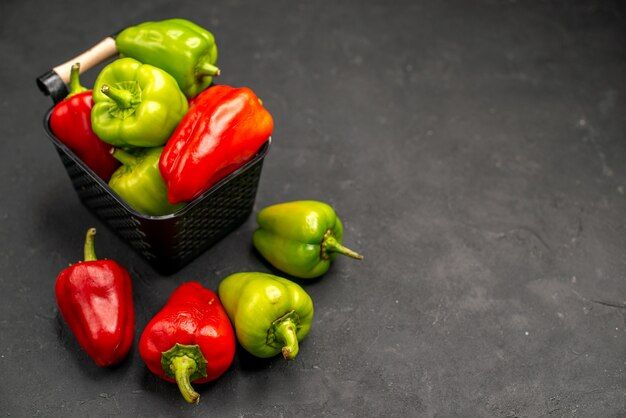 front-view-fresh-bell-peppers-inside-basket-dark-floor-meal-salad-color-photo-ripe_140725-141767.jpg