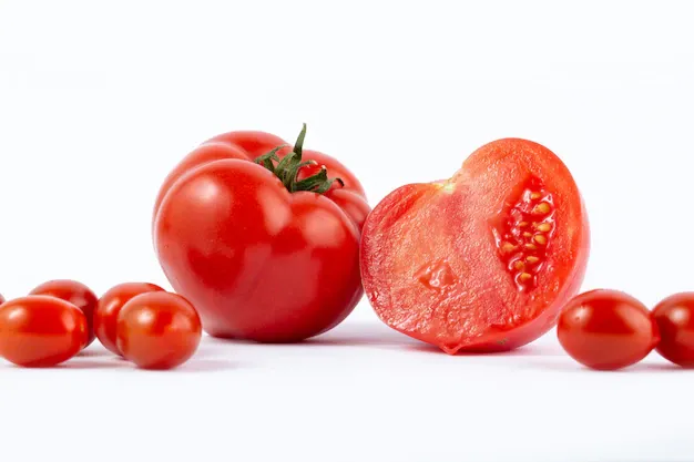 red-tomatoe-fresh-collected-sliced-along-with-red-cherry-tomatoes-white-desk_179666-81.webp