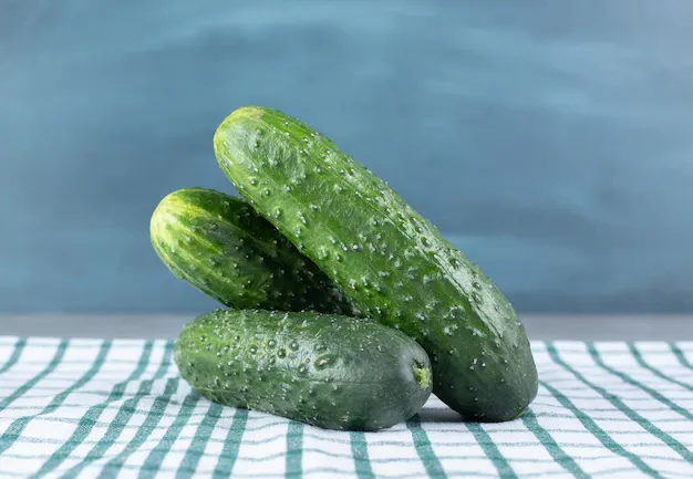 three-fresh-cucumbers-isolated-tablecloth-high-quality-photo_114579-78413.webp