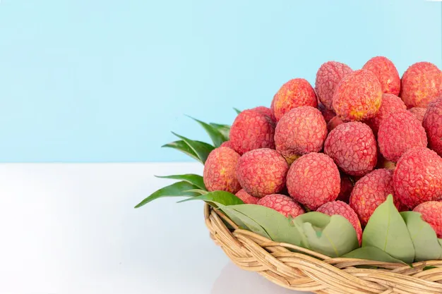 red-lychee-fruit-placed-basket_1150-13753.webp