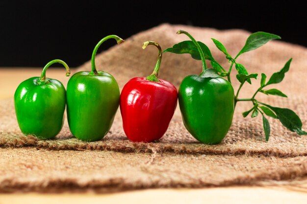 rocoto-manzano-rojo-chili-peppers-capsicum-pubescens-wooden-table_86639-655.jpg