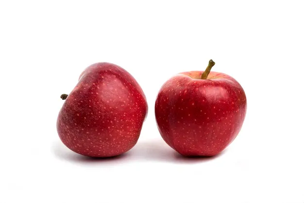 two-red-apples-isolated-white_114579-73124.webp