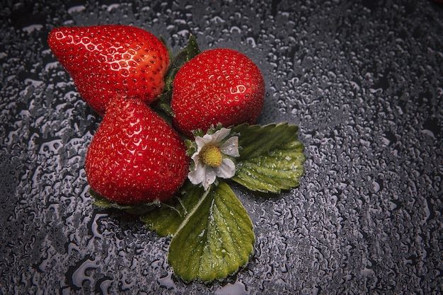 strawberries-natural-slate-base-dark-food-photograhpy_181624-61119.jpg