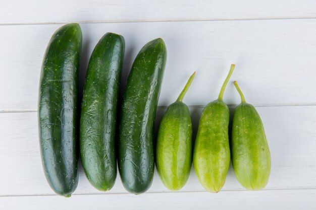 top-view-cucumbers-wooden-surface_141793-10012.jpg