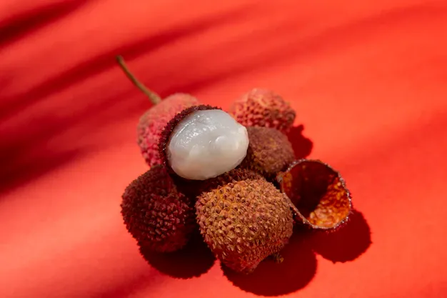 composition-delicious-exotic-litchis_23-2149090921.webp