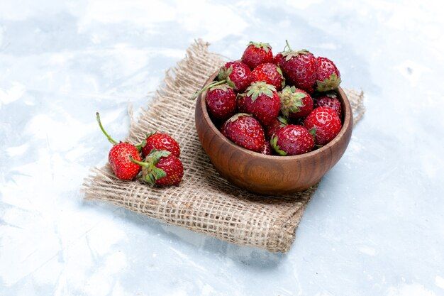 front-close-view-fresh-red-strawberries-inside-brown-pot-light-white-desk-berry-fruit-fresh-vitamine-taste-photo_140725-52666.jpg