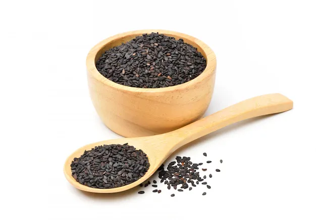 black-sesame-seeds-wooden-bowl-wooden-spoon-isolated-white-background_252965-29.webp