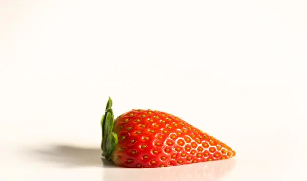 closeup-shot-fresh-strawberry-isolated_181624-37699.webp