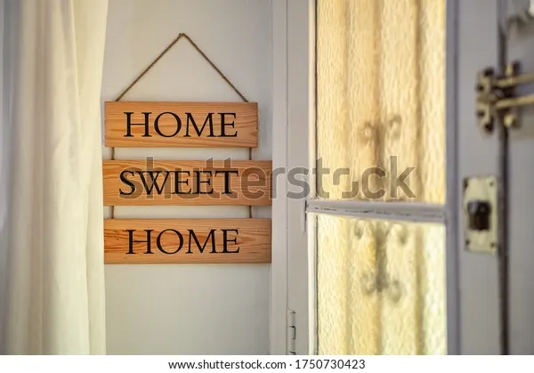 home-sweet-text-on-wooden-600w-1750730423.webp