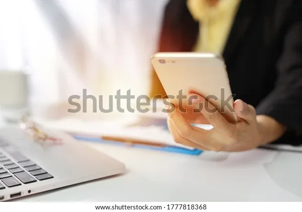 businesswoman-hands-black-suit-sitting-600w-1777818368.webp