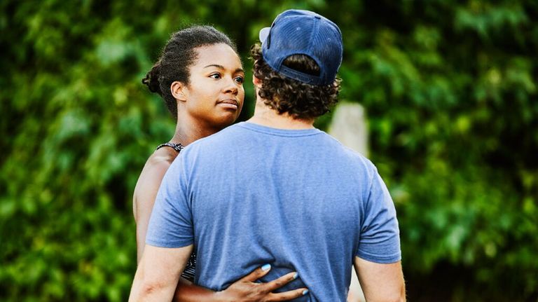 woman-wife-embracing-man-husband-outdoors-mixed-race-couple-1296x728-header-1024x575.jpg