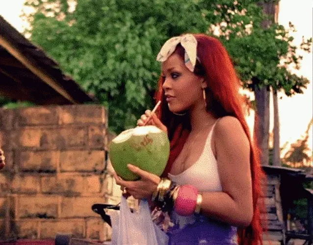 rihanna-drinking-coconut-juice-3moblpegu70ixco0.webp