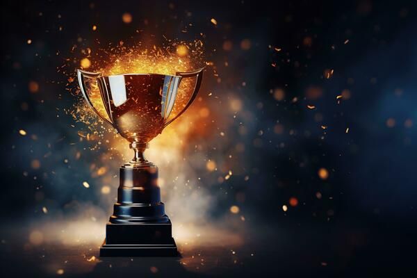 generative-ai-winner-trophy-with-flames-golden-champion-cup-with-falling-confetti-on-dark-background-photo.jpg