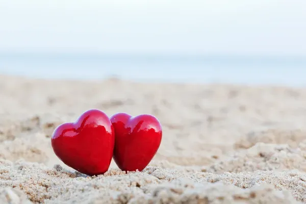 depositphotos_38303587-stock-photo-two-red-hearts-on-the.jpg