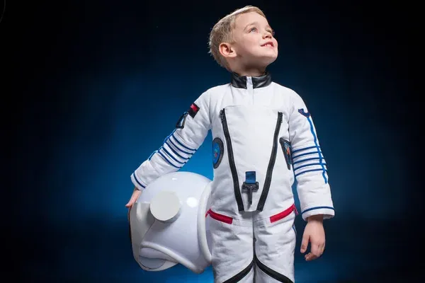 depositphotos_140012860-stock-photo-little-boy-in-space-suit.jpg