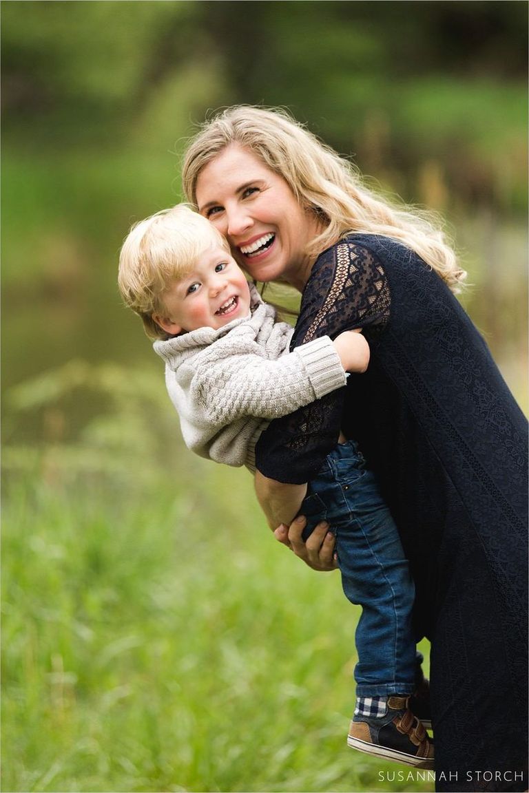 mom-son-snuggle-during-outdoor-portrait-in-longmont-photo.jpg