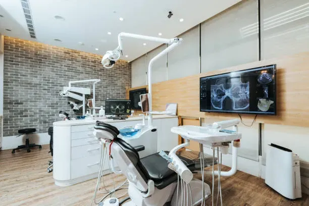 dentist-office-with-modern-equipment-and-microscope.webp